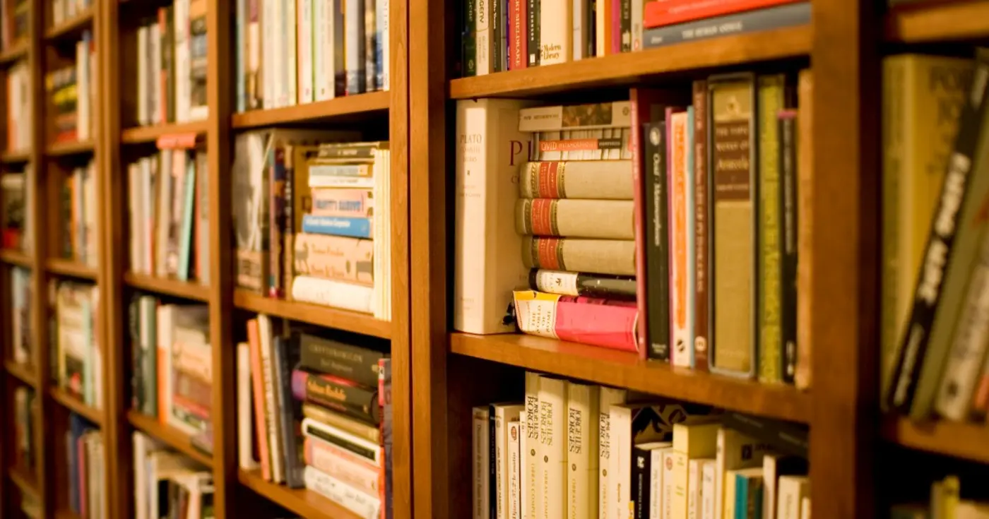 what our shelves of unread books teach us about ourselves