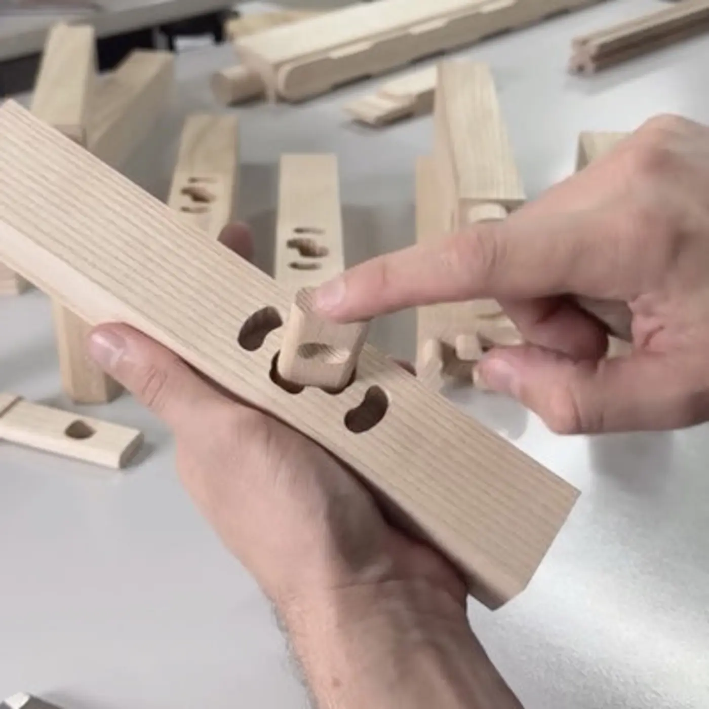 industrial designer develops unusual wooden connectors for flatpack furniture