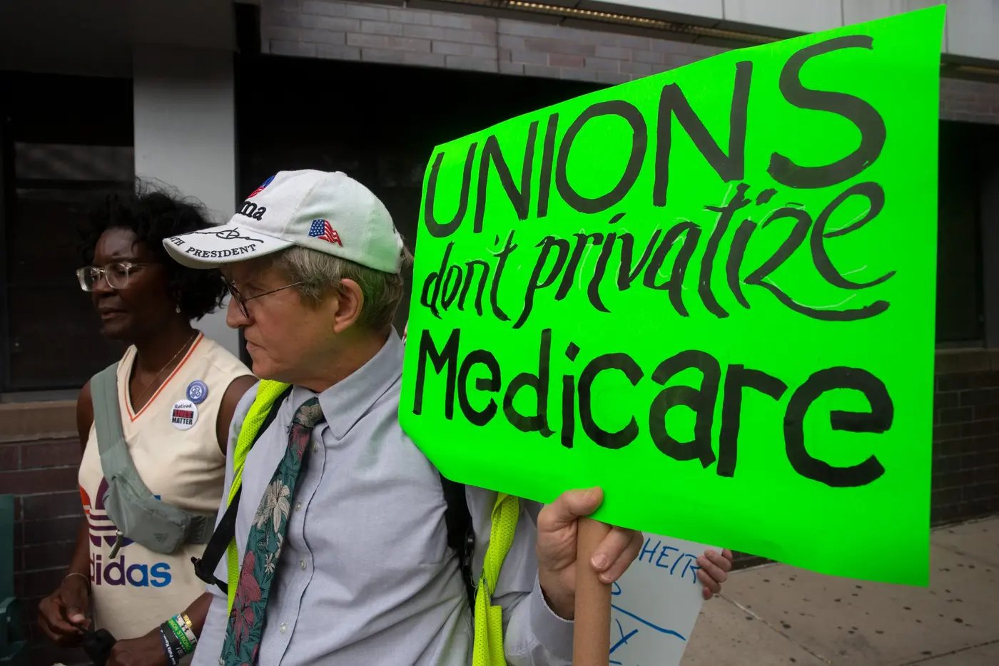 city unions ok costsavings health plan switch despite foggy details