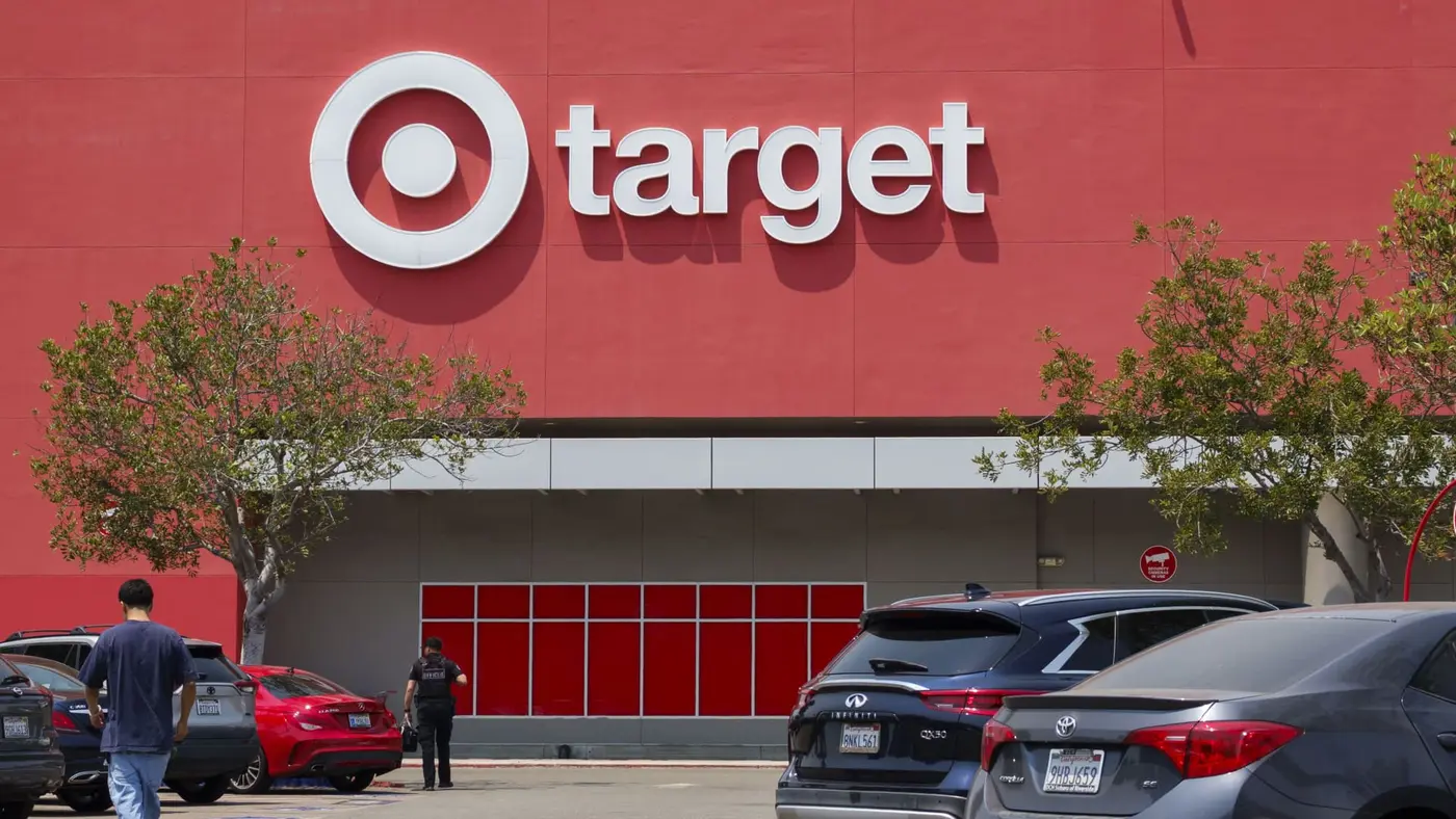 target cuts 1800 corporate jobs in its first major layoffs in a decade
