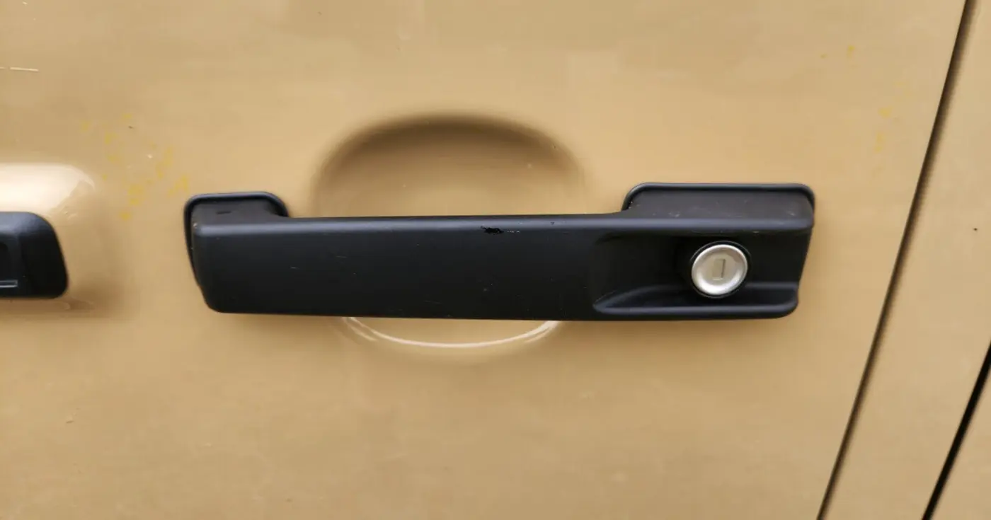 the overlooked evolution of the humble car door handle