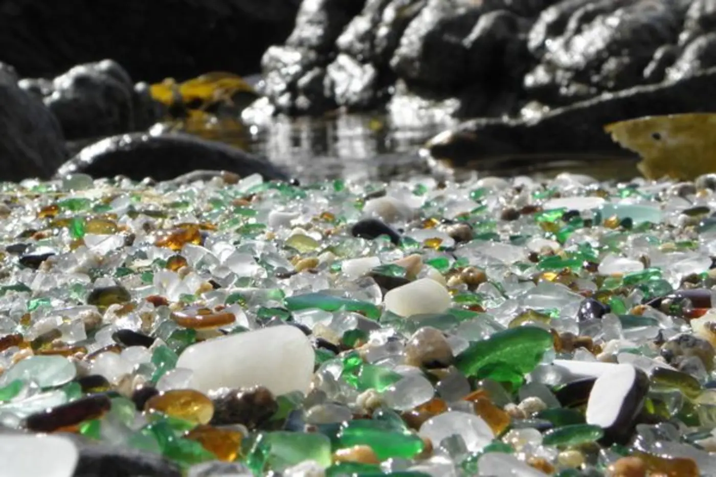 praia dos cristais tiny spanish beach covered in sea glass