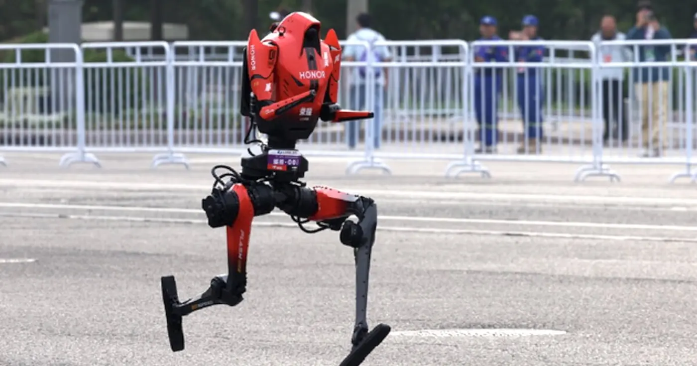 robot smashes human record in halfmarathon as another selfdestructed