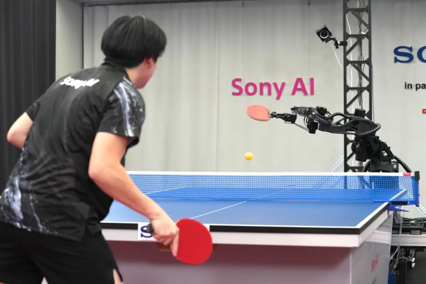 a robot is beating human pros at table tennis