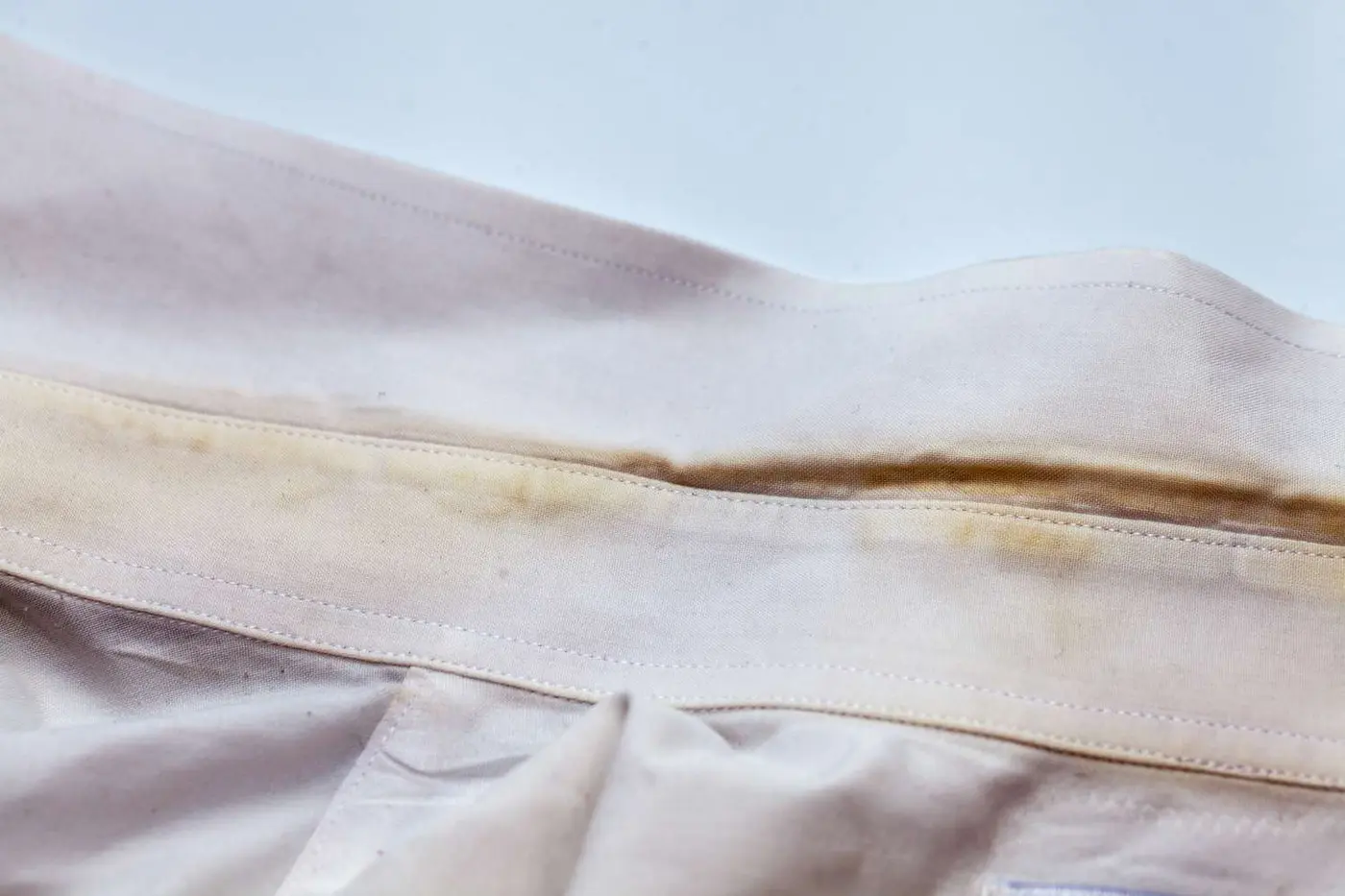 how to prevent white clothes from turning yellow in storage