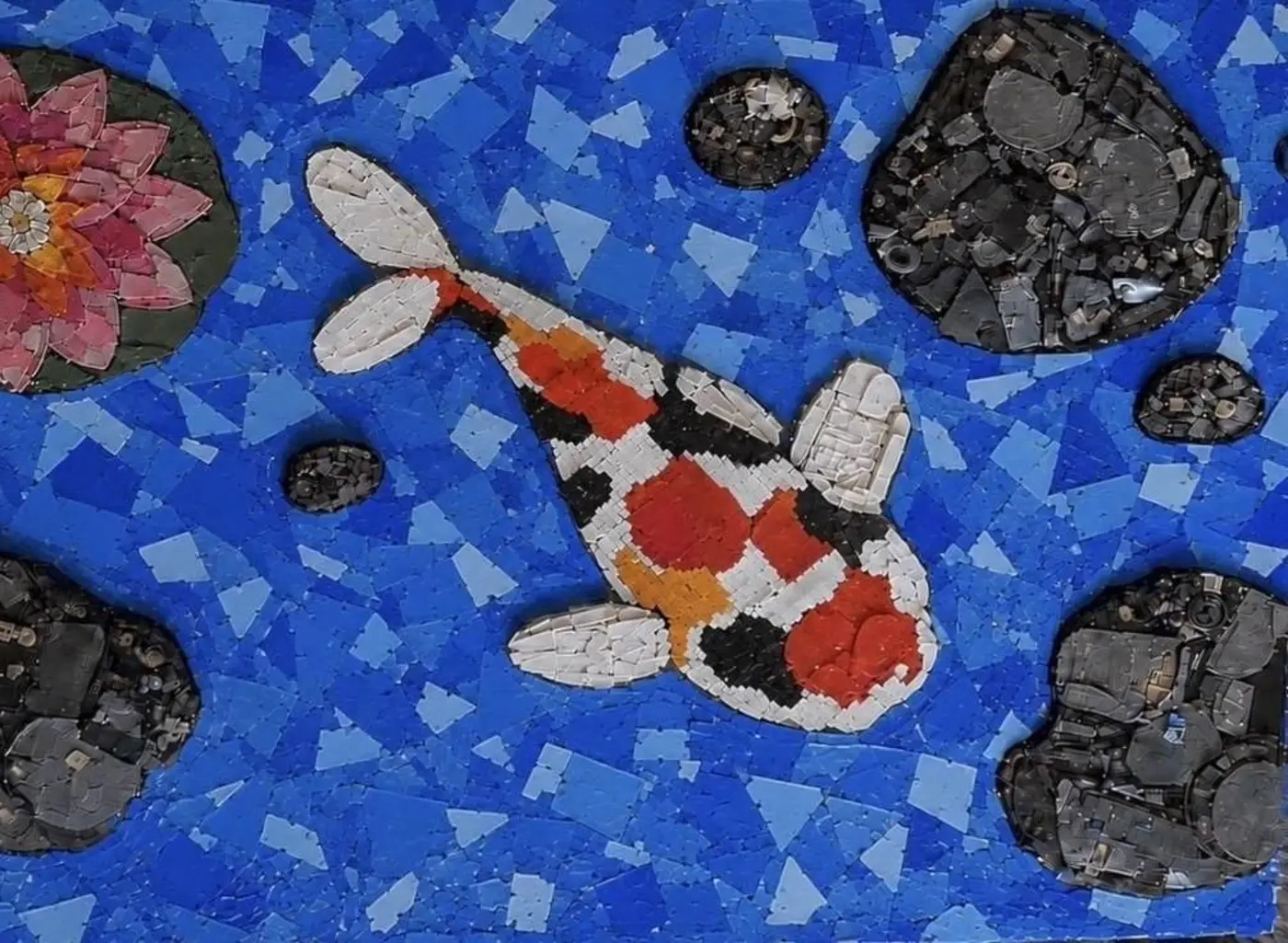 a koi pond mosaic made from 10 pounds of 3d printer waste