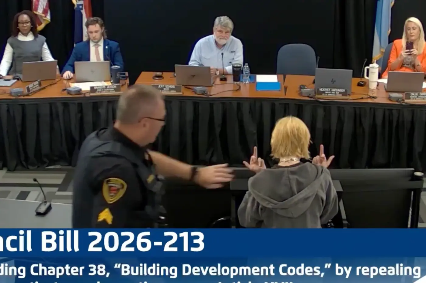 woman arrested dragged away after speaking about flock at city council meeting