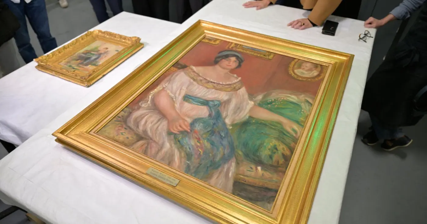 stolen renoir paintings found hidden and damaged behind cinder block wall